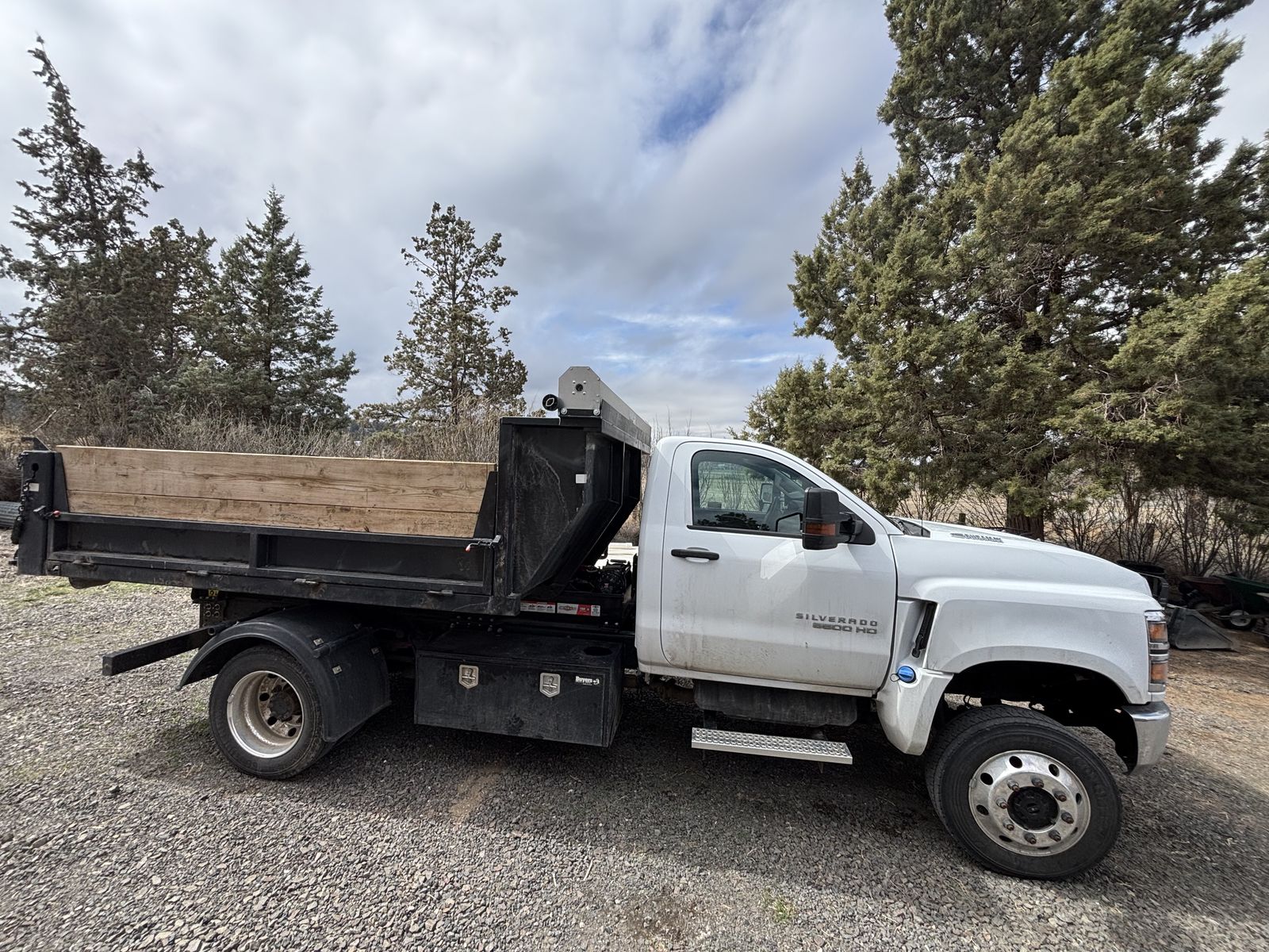 Dump truck delivering bulk materials